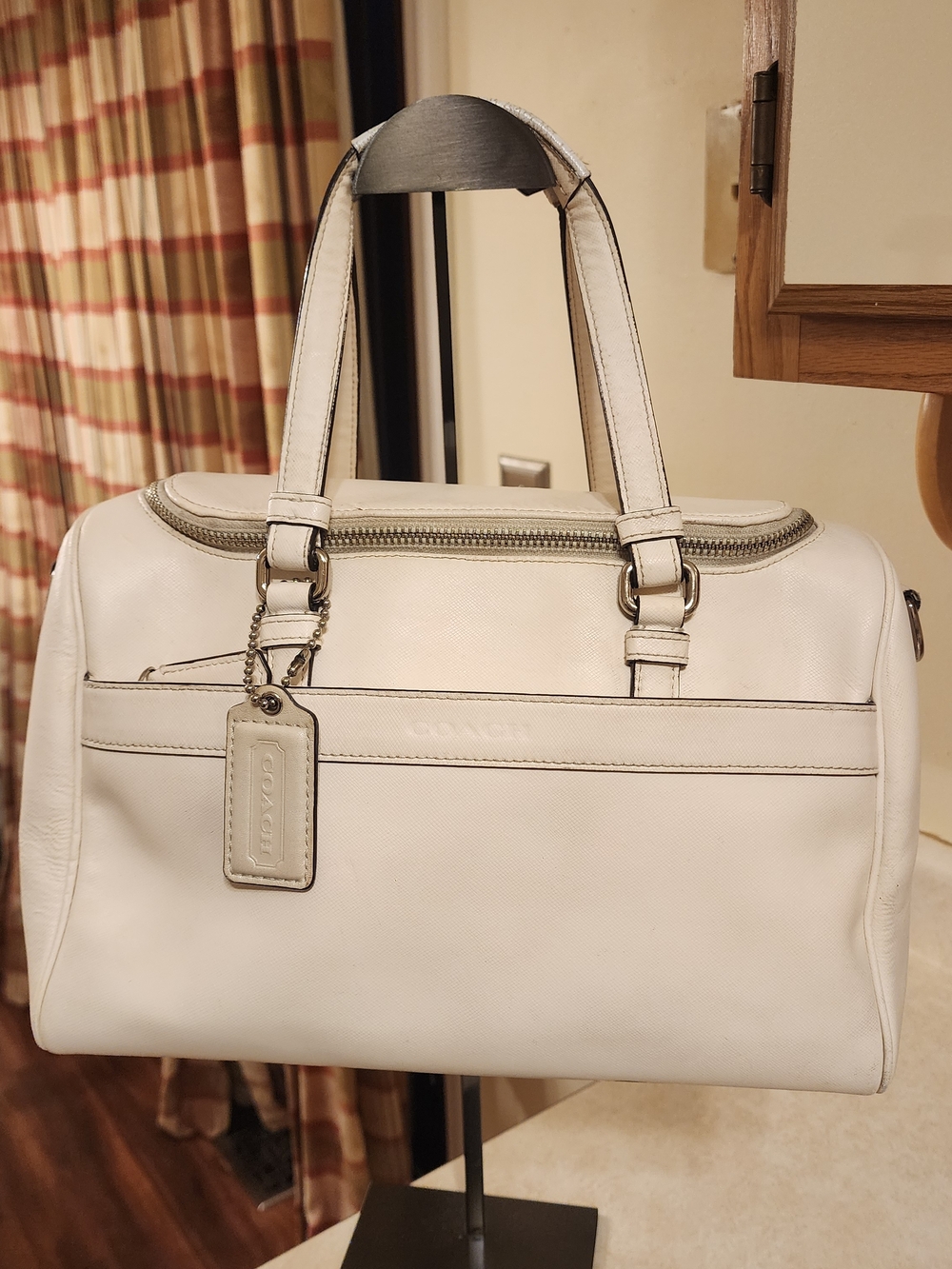 white leather Coach Travel tote handbag featuring silver-tone hardware